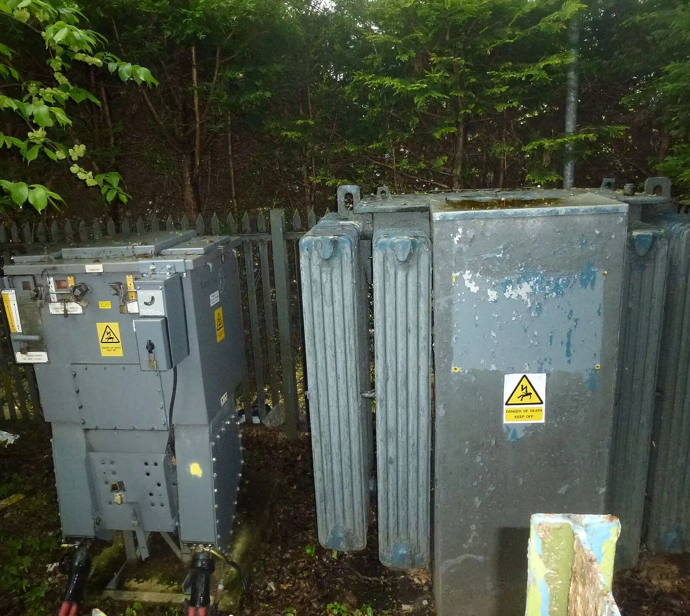 Switchgear and a transformer at an electricity substation — a generic illustrative view of substation equipment, not the Marsa Alam site.