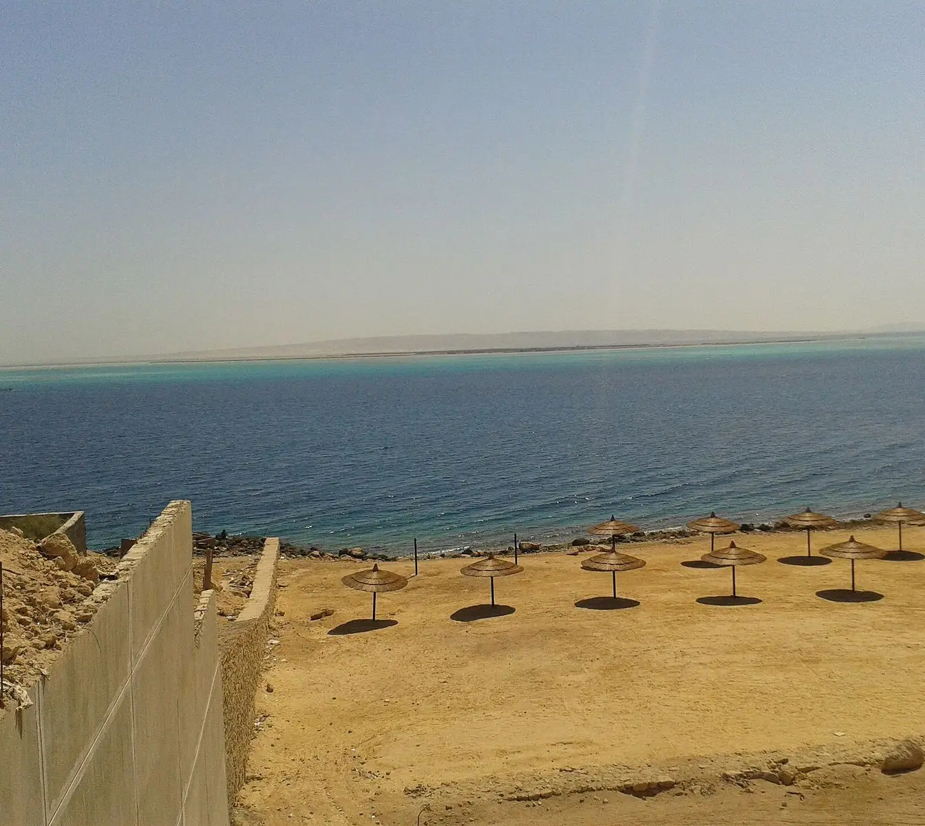 The Red Sea seen from the shoreline at Hurghada on a clear day.