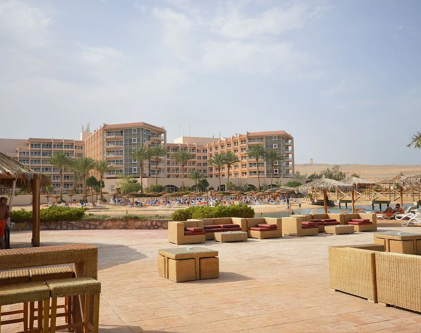 The grounds and low-rise buildings of the Marriott resort hotel in Hurghada, seen from the water's edge.