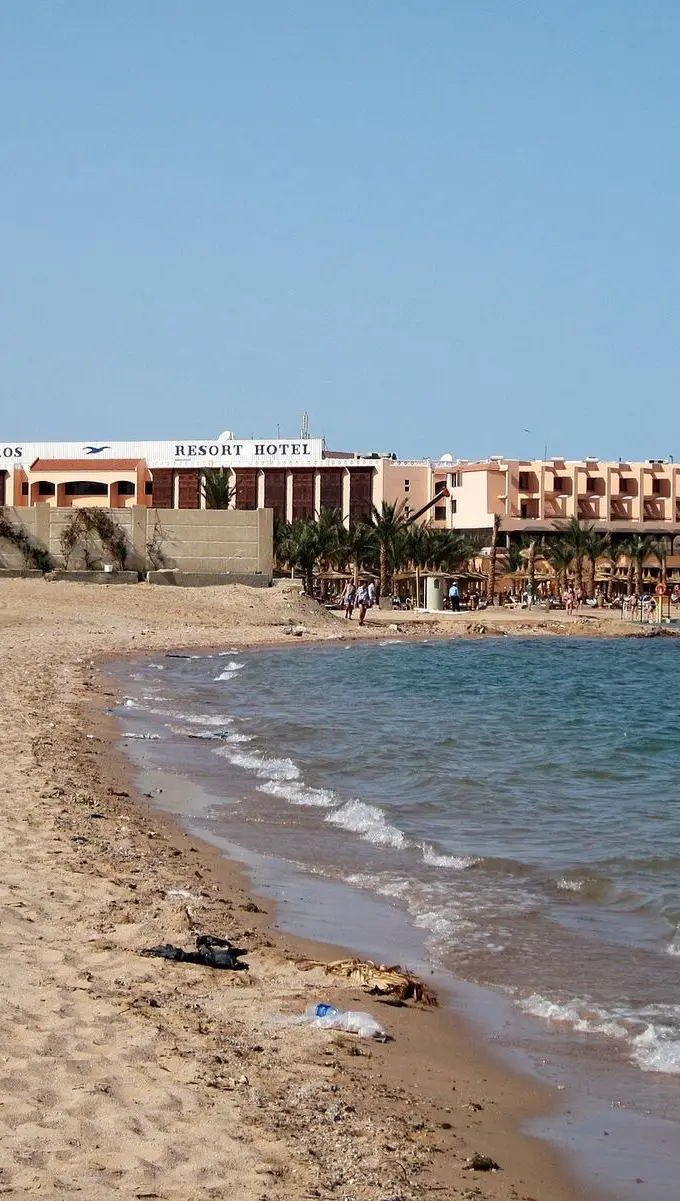 Sunloungers and parasols on a hotel beach at Hurghada on the Red Sea coast.