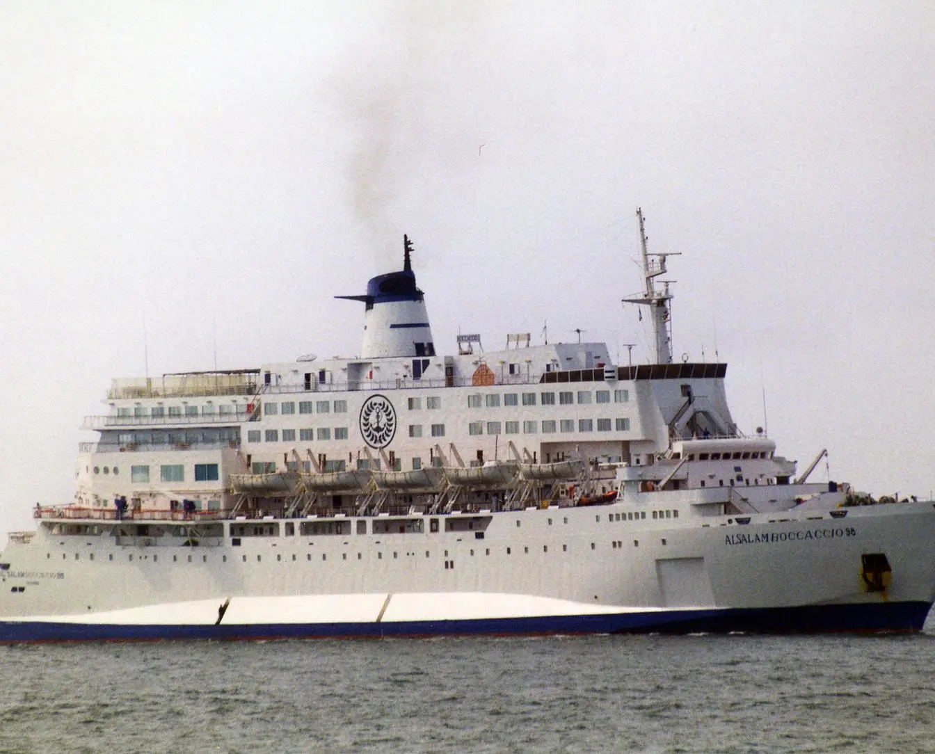 The ferry Al Salam Boccaccio 98 under way at sea, its name painted on the white hull — an archive photograph taken off Genoa in 2001, five years before the ship sank.