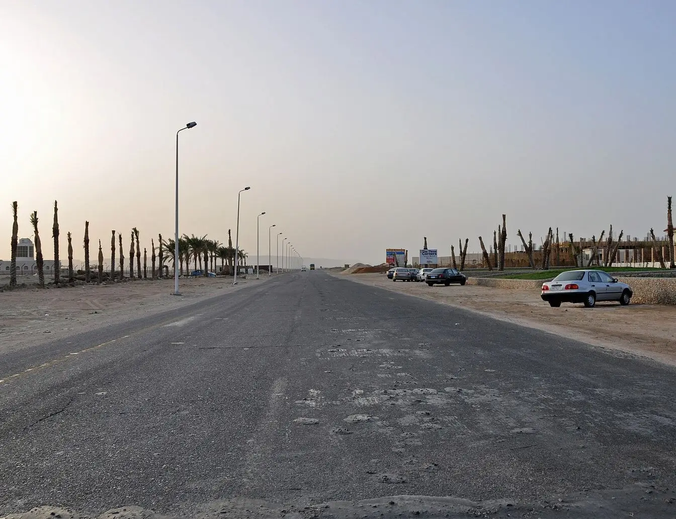 A road in Hurghada, Egypt, showing typical roadside conditions in the city