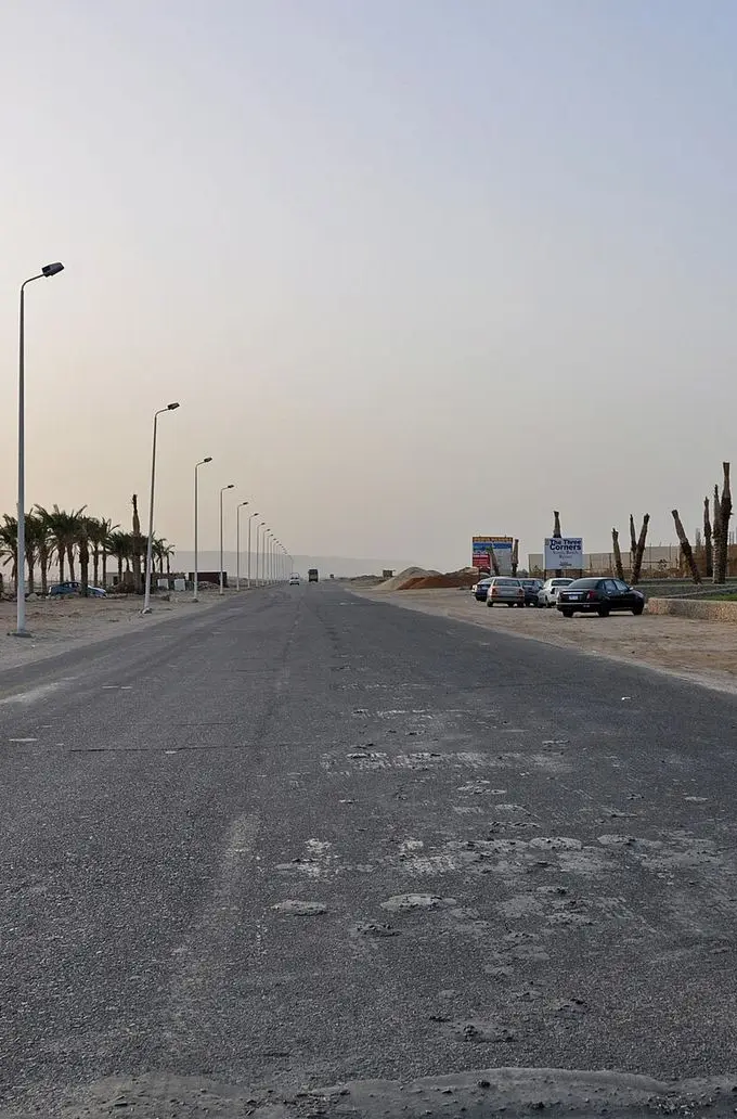 A road in Hurghada, Egypt, showing typical roadside conditions in the city