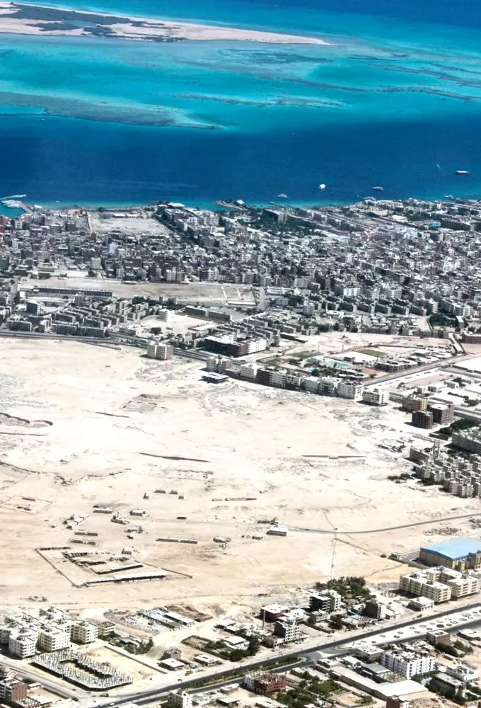 An aerial view over Hurghada. The photo is a general view of the city and does not show the Mubarak 11 district or the water works described in the article.