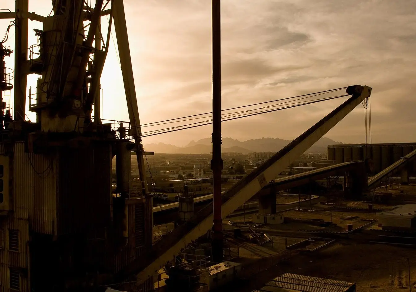 Cranes and cargo facilities at Safaga port at sunset