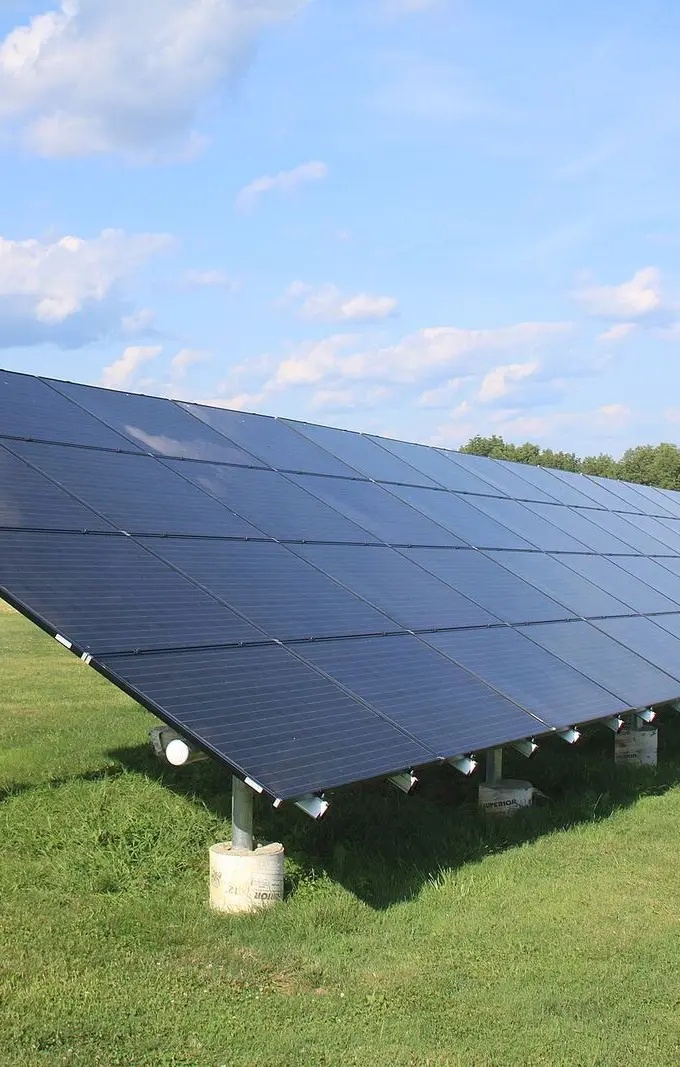 Ground-mounted solar panels, a generic illustrative image of solar power generation — not a photo of the Hurghada project itself
