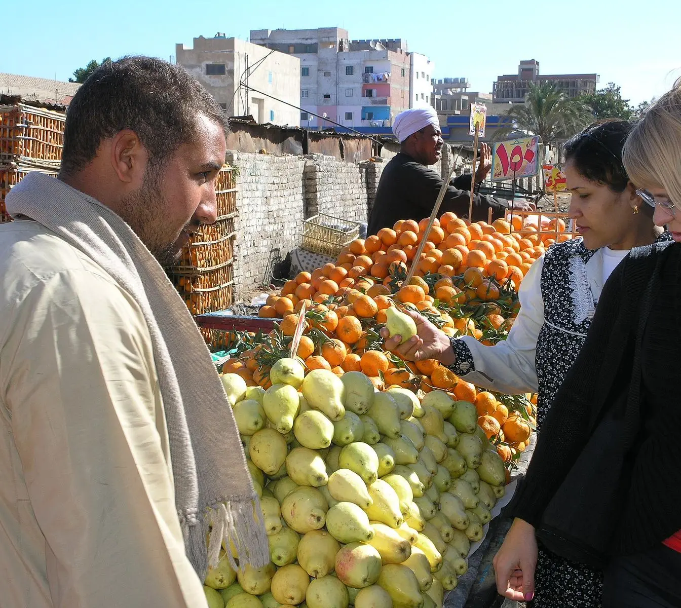 A fruit seller at a market in Hurghada. File photo; not one of the discount outlets in the scheme.