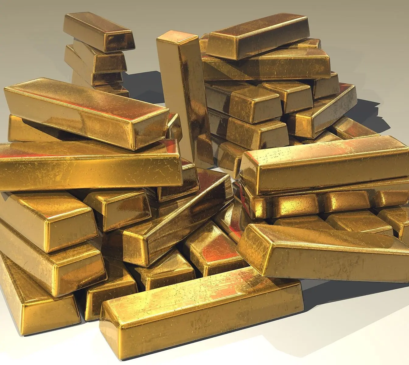 Gold bullion bars on a plain surface. File photo, not the bars seized in this case.