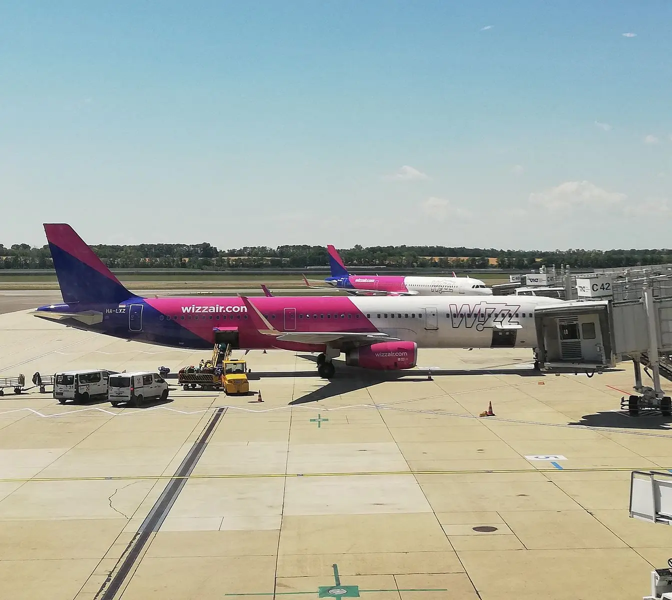 Two Wizz Air aircraft parked on the apron at Vienna Airport. File photo of the airline's fleet, not of an Egypt route.