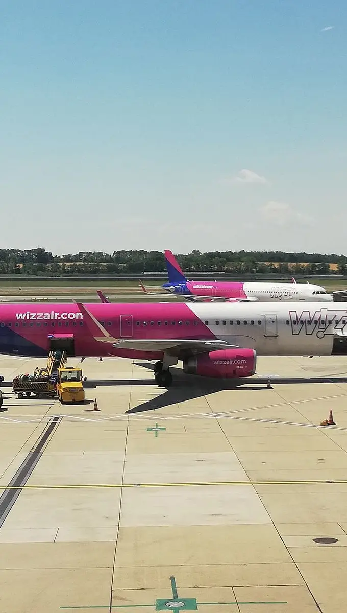 Two Wizz Air aircraft parked on the apron at Vienna Airport. File photo of the airline's fleet, not of an Egypt route.