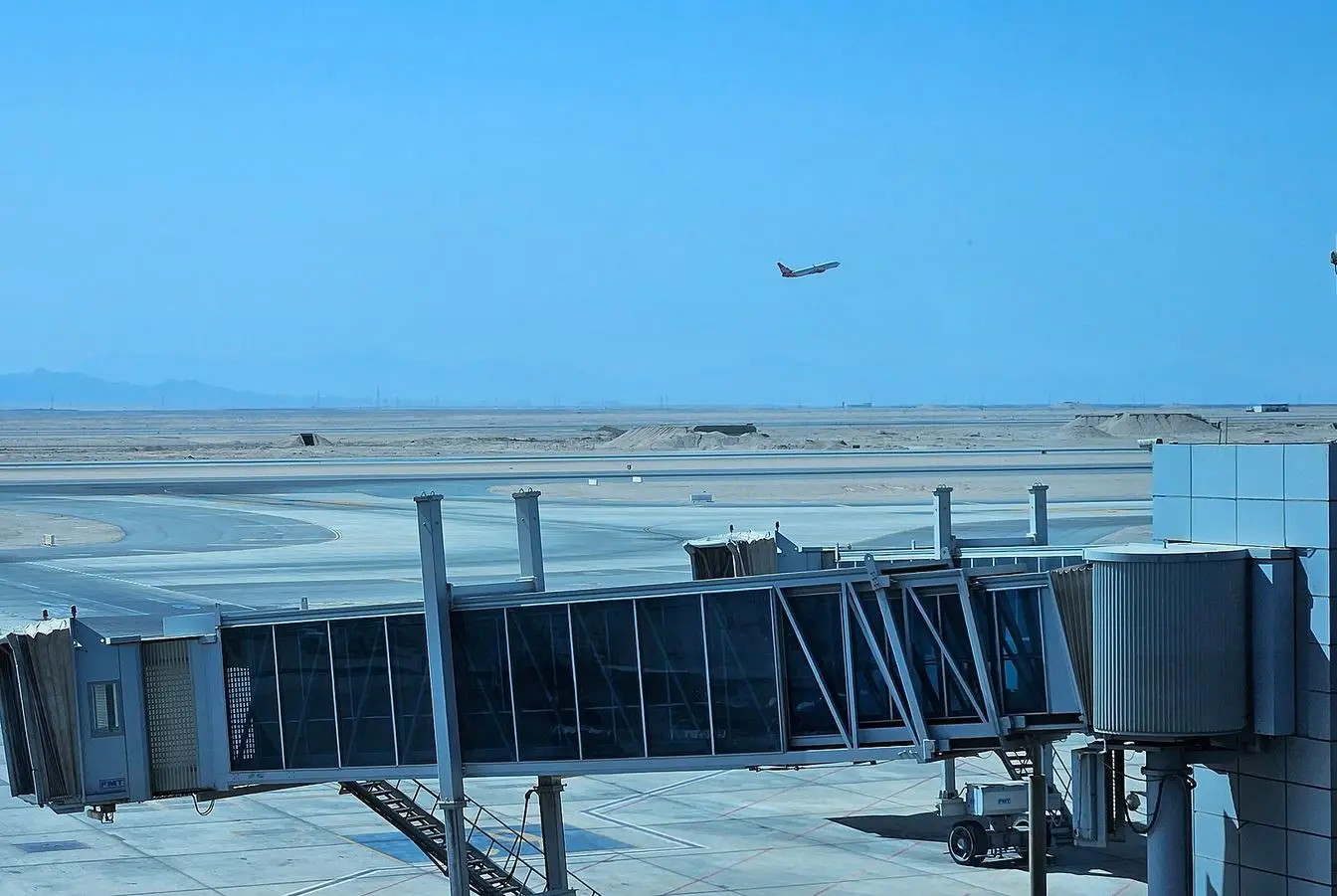 Exterior view of Hurghada International Airport terminal under a clear sky