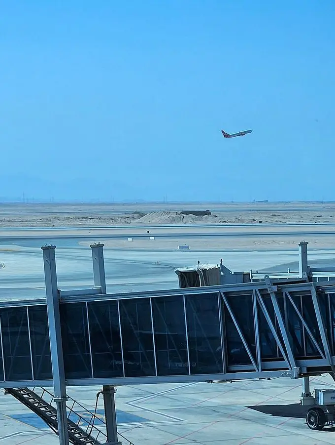 Exterior view of Hurghada International Airport terminal under a clear sky
