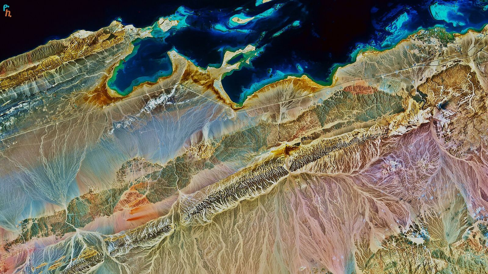 Scenic view of the Red Sea coast of eastern Egypt, with coastal landscape meeting the sea